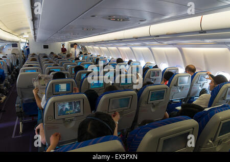 interior of a China Southern Airlines Company Limited (CSN) commercial airplane. It is the largest airline company in China and Stock Photo