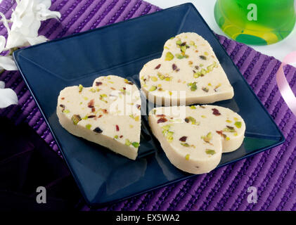 Delicious Sweet in heart shape (Paan Pera) Stock Photo