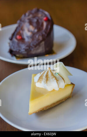 Slice of new york style cheesecake on the plate Stock Photo