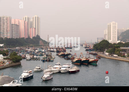 Hong Kong, Hong Kong SAR -November 19, 2014: Fishing boats in Aberdeen harbour in Hong Kong. Stock Photo