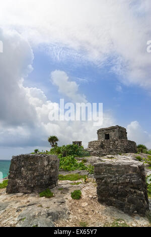 ruins of God of winds mayan temple on a cliff overlooking blue torquoise ocean in Tulum Quintana Roo, Mexico Stock Photo