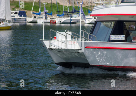 Passenger boat cutting through the water on Lake Edersee in Germany. Stock Photo