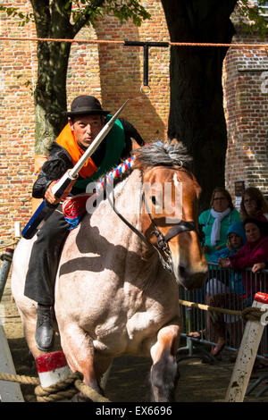 Europe, Netherlands, Zeeland, Walcheren, ring riding in Meliskerke, the rider must skewering a small ring with a lance while gal Stock Photo