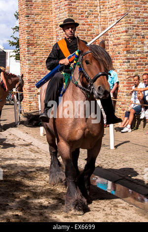 Europe, Netherlands, Zeeland, Walcheren, ring riding in Meliskerke, the rider must skewering a small ring with a lance while gal Stock Photo