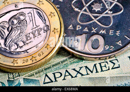 Greek currency - drachmas and 1 Euro on a 1980s 50 Drachma note Stock Photo