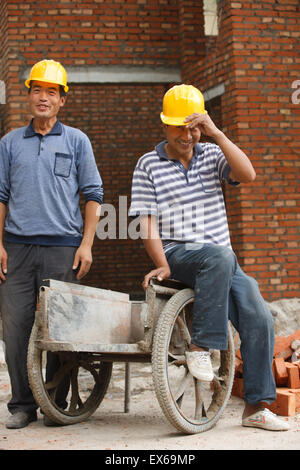 Portrait of two construction workers Stock Photo