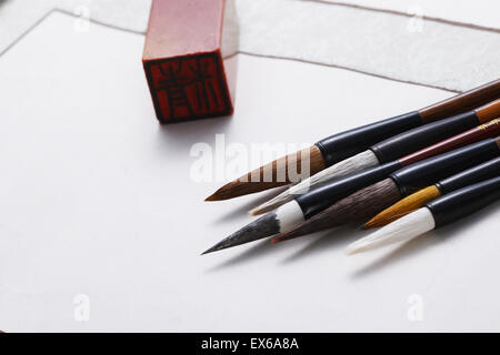 Still life calligraphy brush and chinese Stamp Stock Photo