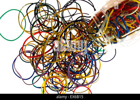 Coloured elastic rubber bands and container on white background Stock Photo