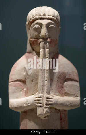 Rome. Italy. Museo di Scultura Antica Giovanni Barracco. Musician playing a double flute (mid 6th C B.C.) from Cyprus. Stock Photo