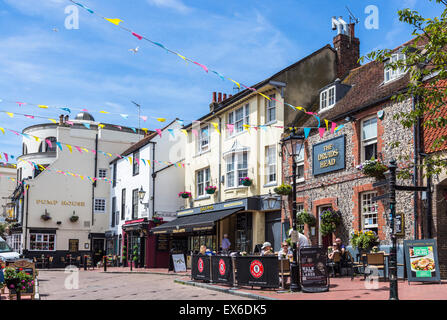 Outdoor dining at the Druids Head, with the Pump House, in The Lanes, Brighton, East Sussex, UK on a sunny summer's day Stock Photo