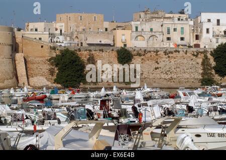 Italy, region Apulia, Otranto, tourist harbor under walls of ancient town Stock Photo