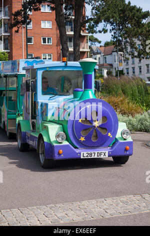 The home of Peppa Pig world - Landtrain driving through Boscombe Chine Gardens, Boscombe, Bournemouth, Dorset in June Stock Photo