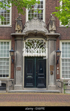 Delft, South Holland, The Netherlands: Entrance with richly decorated skylight of a monumental home- An orphanage for girls. Stock Photo