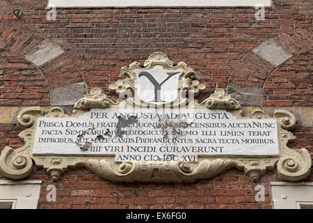 Stone tablet of the Latin School, ( 1807 -1816 ) at  ''The Arms of Savoy'', Oude Delft, Delft, South Holland, The Netherlands. Stock Photo