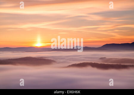 Cloud inversion at sunset over Gummers How Lake District UK Stock Photo ...