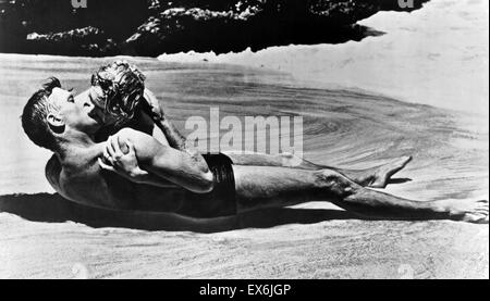 From Here to Eternity is a 1953 drama film directed by Fred Zinnemann. Burt Lancaster and Deborah Kerr in the beach scene at Halona Cove, Oahu, Hawaii. Stock Photo