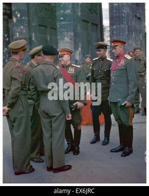 Russian army Marshal Georgy Zhukov, Marshal Konstantin Rokossovsky, and Soviet officers greet British Field Marshall Bernard Montgomery, Berlin 1945 Stock Photo