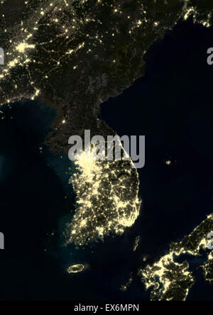 Korean Peninsula at night in 2012. This satellite image shows urban and industrial lights. Stock Photo