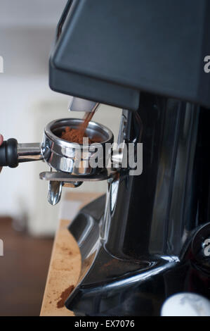 Machine-filling espresso machine basket Stock Photo
