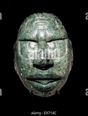 Face of the Mayan Sun God carved in a green stone, 600-900 AD Central American Stock Photo