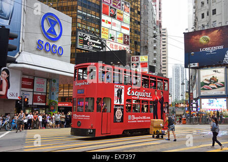 Double Deck Tram with tram body advertising Hong Kong China ( Busy Hong Kong Island ) Stock Photo