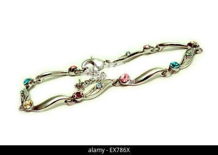 Bracelet made of white metal with colorful stones isolated on white background. Stock Photo