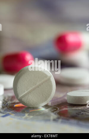 Mixture pills aspirin Ibuprofen painkiller over the counter without a prescription blue amitriptyline tricyclic antidepressant Stock Photo