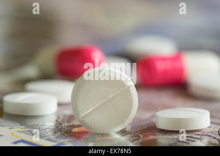 Mixture pills aspirin Ibuprofen painkiller over the counter without a prescription blue amitriptyline tricyclic antidepressant Stock Photo