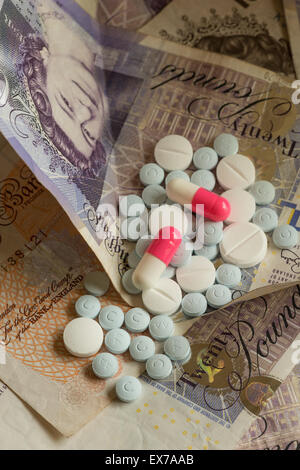 Mixture pills aspirin Ibuprofen painkiller over the counter without a prescription blue amitriptyline tricyclic antidepressant Stock Photo