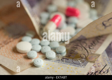 Mixture pills aspirin Ibuprofen painkiller over the counter without a prescription blue amitriptyline tricyclic antidepressant Stock Photo