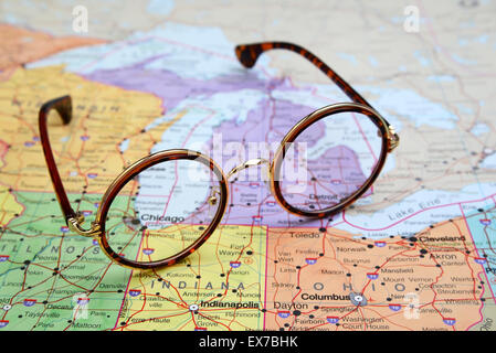 Glasses on a map of USA - Chicago Stock Photo
