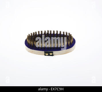 New brass wire brush isolated on white background. Stock Photo