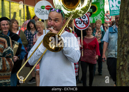 Milton Keynes, Buckinghamshire, UK. 08th July, 2015. Anti-cuts protesters march against George Osborne's Conservative budget announced earlier in the day. The demonstration was organised by Milton Keynes Against the Cuts/Milton Keynes Peoples Assembly. Credit:  David Isaacson/Alamy Live News Stock Photo