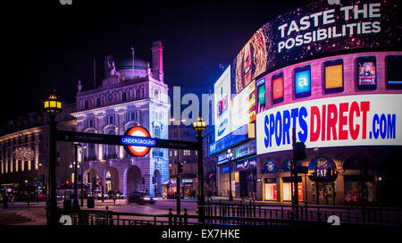 LONDON, ENGLAND - London's Piccadilly Circus lit up by night on October 17, 2013. Stock Photo
