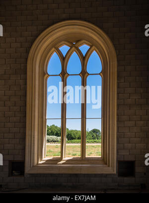 The arched Gothic openings at the monastic chapter house of the Abbey of New Clairvaux that is being restored in Vina, CA, USA. Stock Photo