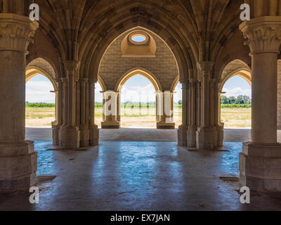 The arched Gothic openings at the monastic chapter house of the Abbey of New Clairvaux that is being restored in Vina, CA, USA. Stock Photo