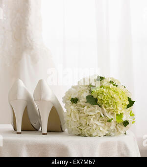 White dress shoes and bouquet Stock Photo
