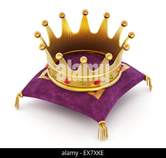 Gold Crown on the purple pillow isolated on white background Stock Photo