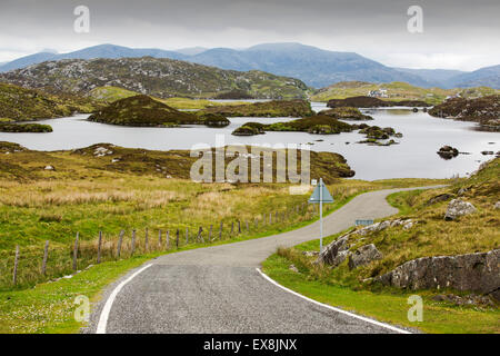 Barren, rugged scenery on the Golden Road on the East side of the Isle of Harris, Outer Hebrides, Scotland, UK. Stock Photo