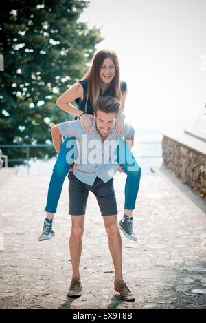 young beautiful couple lovers outdoors Stock Photo