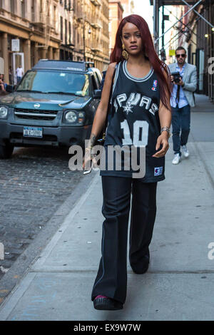 Rihanna wears a San Antonio Spurs jersey while out shopping on SoHo with a friend  Featuring: Rihanna Where: New York City, New York, United States When: 08 May 2015 Stock Photo