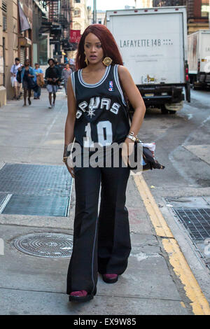 Rihanna wears a San Antonio Spurs jersey while out shopping on SoHo with a friend  Featuring: Rihanna Where: New York City, New York, United States When: 08 May 2015 Stock Photo