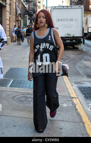 Rihanna wears a San Antonio Spurs jersey while out shopping on SoHo with a friend  Featuring: Rihanna Where: New York City, New York, United States When: 08 May 2015 Stock Photo