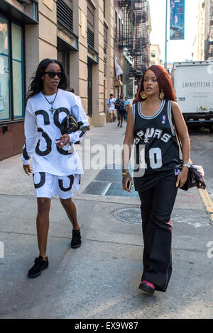 Rihanna wears a San Antonio Spurs jersey while out shopping on SoHo with a friend  Featuring: Rihanna Where: New York City, New York, United States When: 08 May 2015 Stock Photo