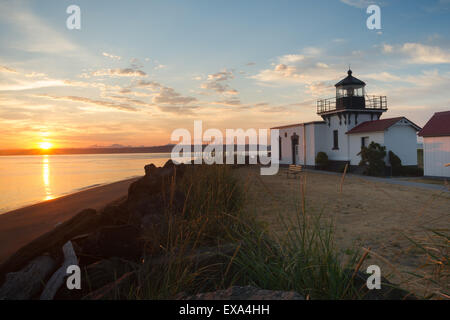 Waves hit the beach in the early morning on Puget Sound Stock Photo