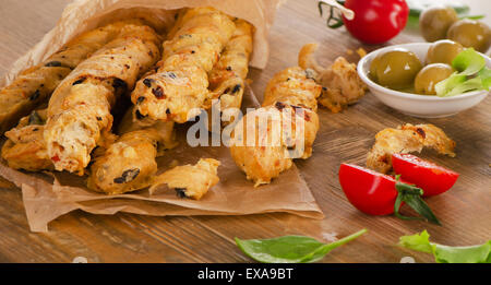 Homemade BreadSticks on  a  rustic wooden board. Selective focus Stock Photo