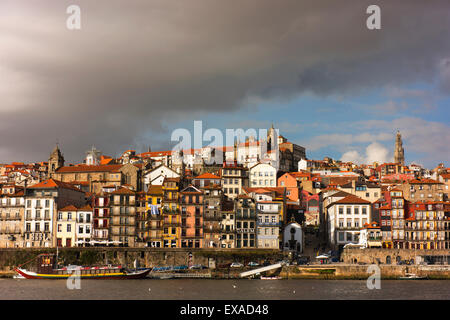 Porto's historical centre, the Ribeira, is a UNESCO World Heritage Site.  Douro River is in the foreground. Stock Photo