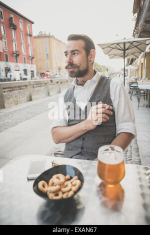 handsome big moustache hipster man in the city Stock Photo