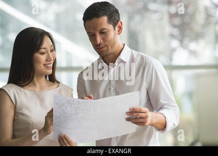 Business associates collaborating Stock Photo