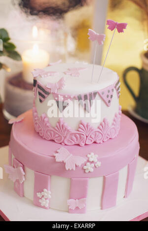 Birthday cake decorated with fondant butterflies Stock Photo